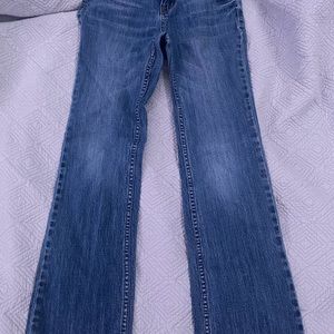 Blue boot cut jeans never been worn
